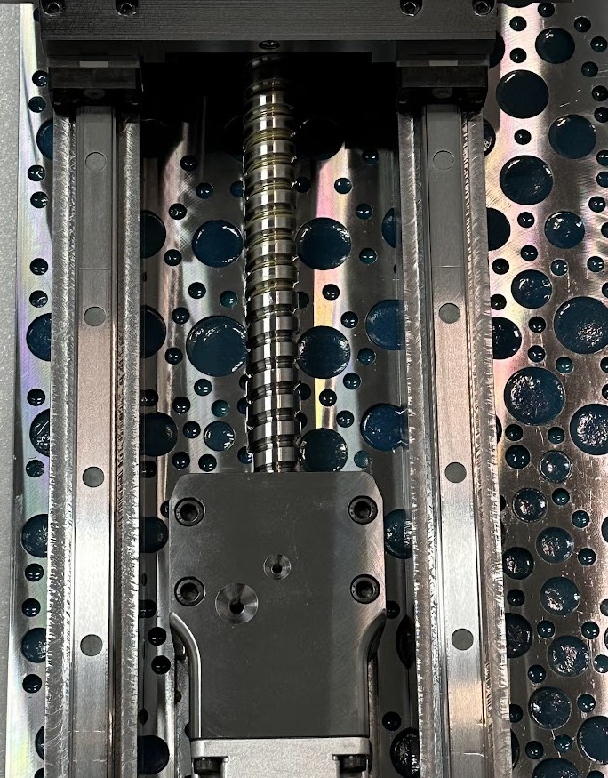 Rigid feed system with torque limiting motors